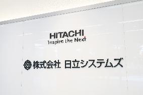 Hitachi Systems logo and signboard